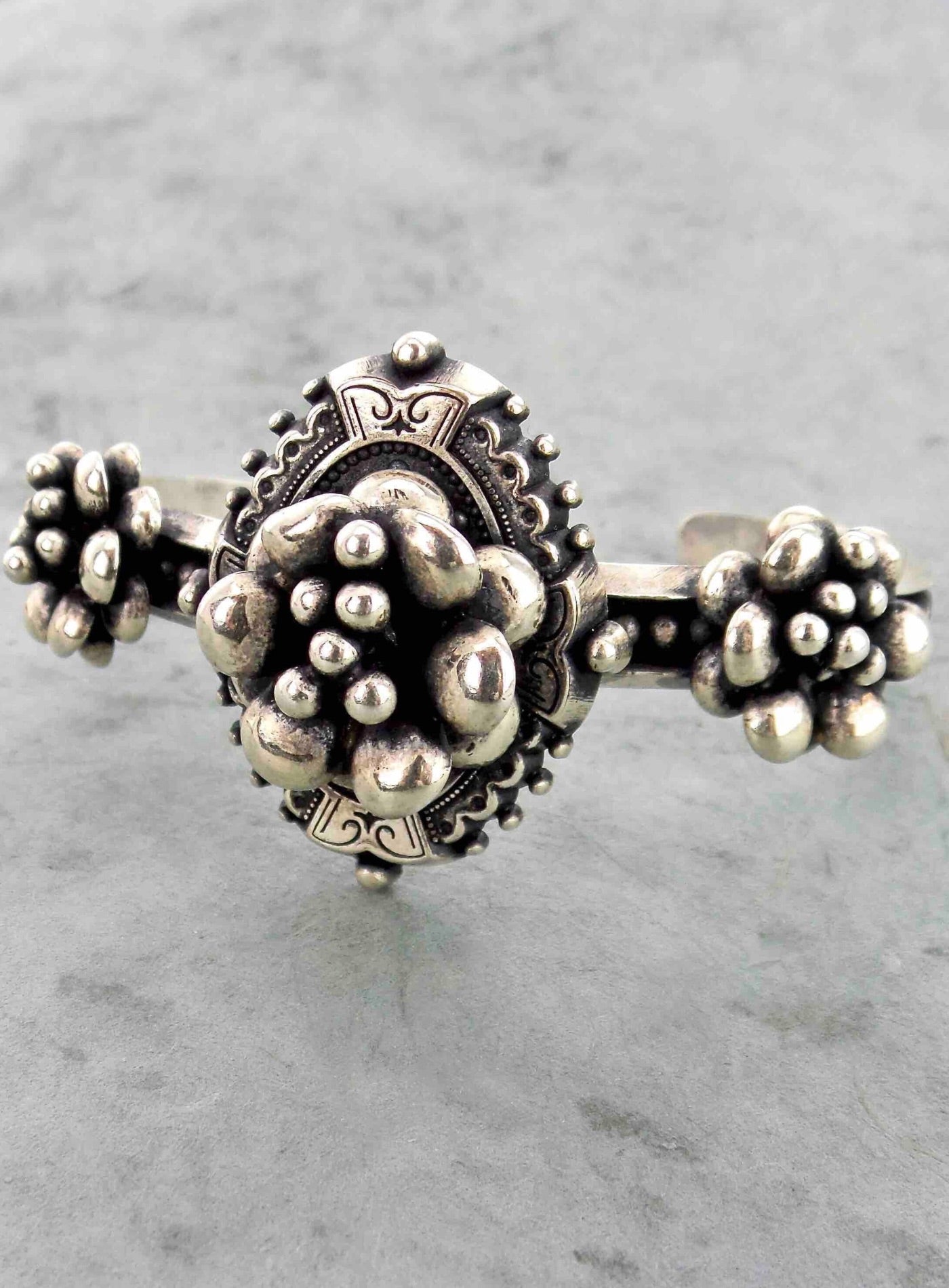 IN THREES ⫸ ORBS FLOWERED MEDALLION CUFF